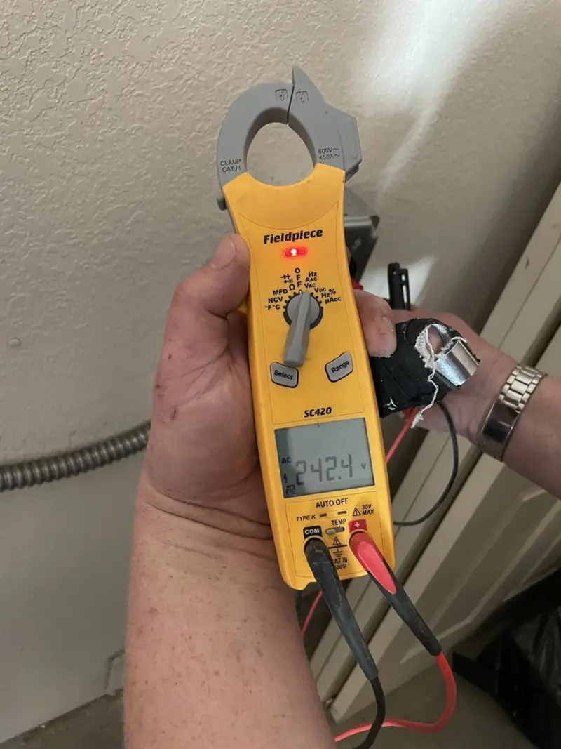 Voltage testing with clamp meter during Generator Installation in Milford
